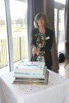 President Diane cutting the celebratory&nbsp;cake
